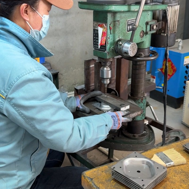 Medical cart component drilling process during metal machining